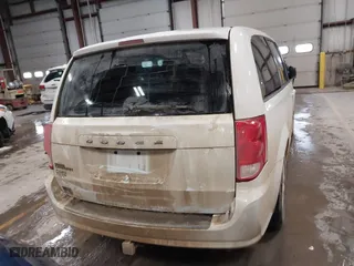 2018 Dodge Grand Caravan SE with VIN 2C4RDGBG0JR180361, listed as a IAAI auction lot 41064126 with 135,841 mi miles. Bid and sale history available at carsss.com. Image 16.
