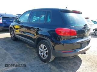 2012 Volkswagen Tiguan LE with VIN WVGAV7AX1CW557250, listed as a IAAI auction lot 42300694 with 122,310 mi miles and . Bid and sale history available at DreamBid. Image 3.