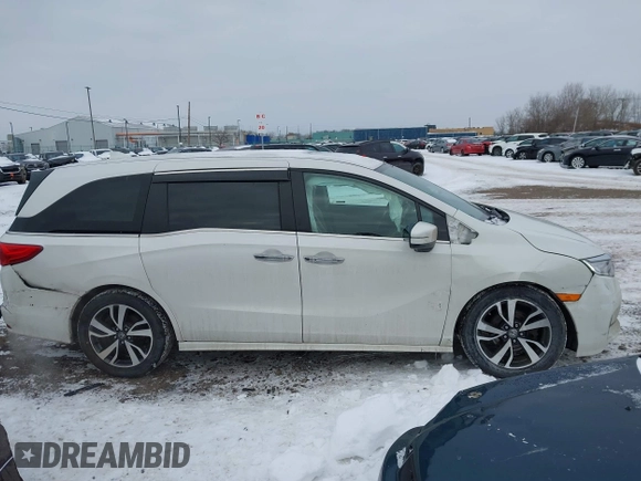 2023 Honda Odyssey Touring with VIN 5FNRL6H84PB048916, listed as a IAAI auction lot 41325052 with 50,290 mi miles and . Bid and sale history available at DreamBid. Image 13.
