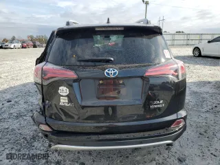 2016 Toyota RAV4 Hybrid XLE with VIN JTMRJREV2GD059101, listed as a Copart auction lot 69439222 with 74,915 mi miles. Bid and sale history available at carsss.com. Image 6.