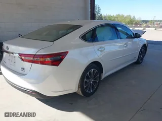 2016 Toyota Avalon Hybrid XLE Premium with VIN 4T1BD1EB2GU048496, listed as a IAAI auction lot 42047633 with 68,900 mi miles. Bid and sale history available at carsss.com. Image 4.