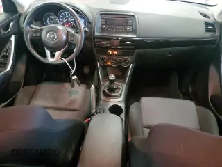 2015 Mazda CX-5 Sport z VIN JM3KE2BE6F0473738, wystawiony jako Copart lot #58718185 z przebiegiem 90 862 mil mil oraz Czysty tytuł • Clean title. Historia ofert i sprzedaży dostępna na DreamBid. Obrazek 8.