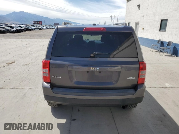 2014 Jeep Patriot Latitude with VIN 1C4NJRFB1ED727017, listed as a Copart auction lot 61660885 with 151,097 mi miles and Salvage title. Bid and sale history available at DreamBid. Image 6.