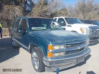 1998 Chevrolet Tahoe with VIN 1GNEC13R6WJ337859, listed as a IAAI auction lot 41418364 with 246,304 mi miles. Bid and sale history available at carsss.com. Image 1.