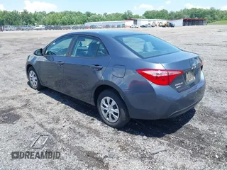 2019 Toyota Corolla L with VIN 2T1BURHE4KC195952, listed as a IAAI auction lot 42534523 with 144,238 mi miles and . Bid and sale history available at DreamBid. Image 3.