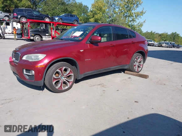 2014 BMW X6 xDrive35i z VIN 5UXFG2C57E0C44052, wystawiony jako IAAI lot #40231766 z przebiegiem 131 573 mil mil oraz . Historia ofert i sprzedaży dostępna na DreamBid. Obrazek 23.