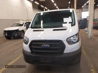 2020 Ford Transit Cargo with VIN 1FTBR1Y81LKA74678, listed as a IAAI auction lot 41173381 with 39,137 mi miles and . Bid and sale history available at DreamBid. Image 13.