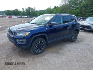 2021 Jeep Compass Trailhawk with VIN 3C4NJDDB0MT590442, listed as a IAAI auction lot 42543530 with 66,669 mi miles and . Bid and sale history available at DreamBid. Image 2.