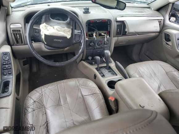 2002 Jeep Grand Cherokee Laredo with VIN 1J4GW48N02C165868, listed as a Copart auction lot 82228494 with 0 mi miles and Salvage Title. Bid and sale history available at carsss.com. Image 8.