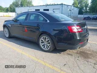 2014 Ford Taurus Limited with VIN 1FAHP2F86EG163392, listed as a IAAI auction lot 42538336 with 131,910 mi miles and . Bid and sale history available at DreamBid. Image 3.