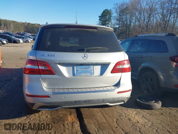 2015 Mercedes-Benz M 350 with VIN 4JGDA5JB9FA561582, listed as a IAAI auction lot 41687386 with 96,784 mi miles and . Bid and sale history available at DreamBid. Image 15.