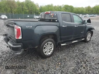 2018 GMC Canyon 4WD SLT z VIN 1GTG6DEN9J1104099, wystawiony jako Copart lot #56195235 z przebiegiem 115 308 mil mil oraz Szkoda całkowita • Salvage title. Historia ofert i sprzedaży dostępna na DreamBid. Obrazek 3.