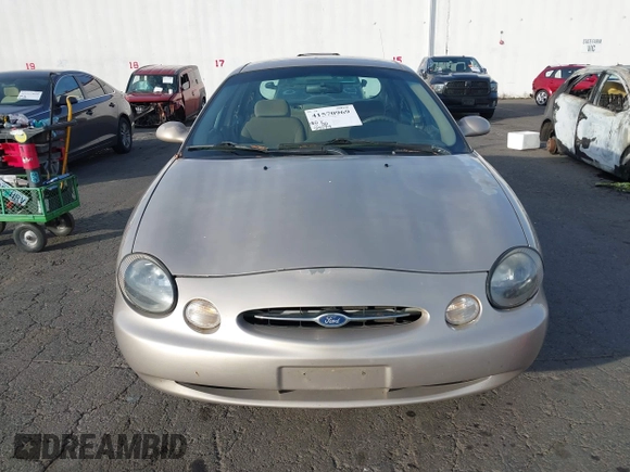 1999 Ford Taurus SE with VIN 1FAFP53U4XG223246, listed as a IAAI auction lot 41570969 with 59,064 mi miles. Bid and sale history available at carsss.com. Image 6.