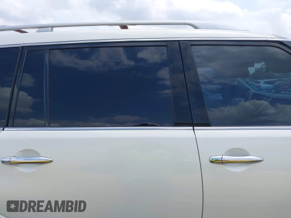 2012 Infiniti QX56 7-passenger with VIN JN8AZ2NF0C9517001, listed as a IAAI auction lot 42101650 with 225,257 mi miles. Bid and sale history available at carsss.com. Image 13.