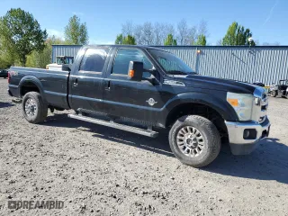 2015 Ford Super Duty F-350 SRW Platinum with VIN 1FT8W3BT2FEA21650, listed as a Copart auction lot 54044925 with 270,987 mi miles and Salvage Title. Bid and sale history available at carsss.com. Image 4.