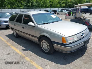 1990 Ford Taurus with VIN 1FACP57U2LA249516, listed as a IAAI auction lot 42682541 with 69,883 mi miles and . Bid and sale history available at DreamBid. Image 1.