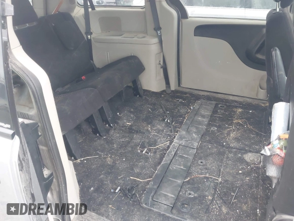 2013 Dodge Grand Caravan SE with VIN 2C4RDGBG2DR773577, listed as a IAAI auction lot 41823951 with 226,498 mi miles and . Bid and sale history available at DreamBid. Image 8.