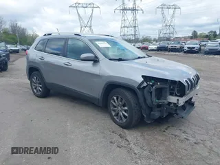 2015 Jeep Cherokee Limited with VIN 1C4PJMDS4FW650454, listed as a IAAI auction lot 42044380 with 123,837 mi miles. Bid and sale history available at carsss.com. Image 1.