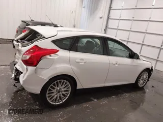2014 Ford Focus Titanium with VIN 1FADP3N27EL110287, listed as a IAAI auction lot 42210697 with 107,741 mi miles and . Bid and sale history available at DreamBid. Image 13.