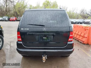 2001 Mercedes-Benz M-Class with VIN 4JGAB72E41A275216, listed as a IAAI auction lot 41953087 with 243,589 mi miles. Bid and sale history available at carsss.com. Image 16.