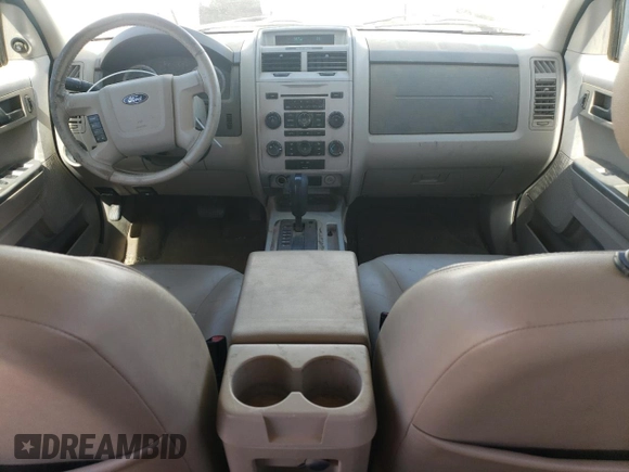 2008 Ford Escape XLT с VIN 1FMCU03128KC70462, выставлен на аукционе Copart как лот 57118055 с пробегом 215 790 миль миль и Списание • Salvage title. История ставок и продаж доступна на DreamBid. Изображение 8.