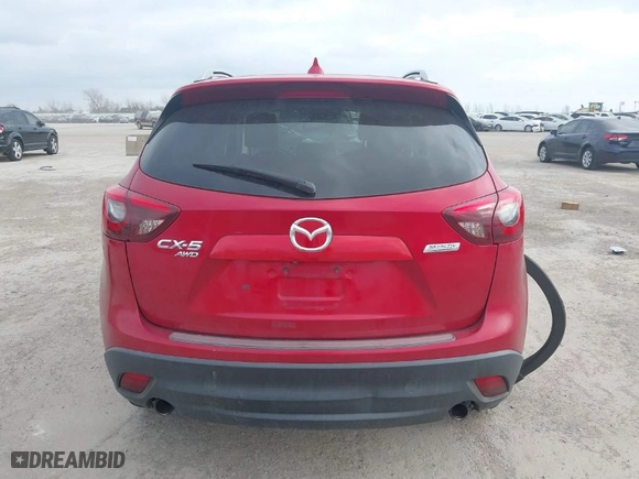 2016 Mazda CX-5 Grand Touring with VIN JM3KE4DYXG0641174, listed as a IAAI auction lot 41182655 with NaN miles. Bid and sale history available at carsss.com. Image 16.