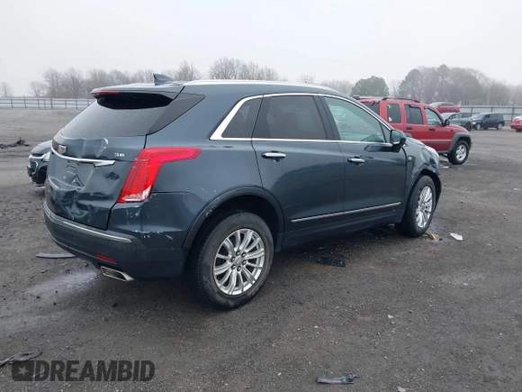 2019 Cadillac XT5 FWD with VIN 1GYKNARS5KZ220134, listed as a IAAI auction lot 41472927 with 58,229 mi miles and . Bid and sale history available at DreamBid. Image 4.