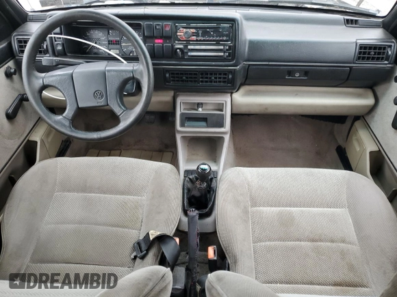 1991 Volkswagen Jetta z VIN WVWRA21G1MW029277, wystawiony jako Copart lot #50025755 z przebiegiem 429 079 mil mil oraz Szkoda całkowita • Salvage title. Historia ofert i sprzedaży dostępna na DreamBid. Obrazek 8.