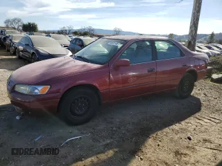 1997 Toyota Camry LE z VIN JT2BG22K7V0085966, wystawiony jako Copart lot #46535145 z przebiegiem Nie podano mil oraz Nie do naprawy • Non repairable. Historia ofert i sprzedaży dostępna na DreamBid. Obrazek 1.