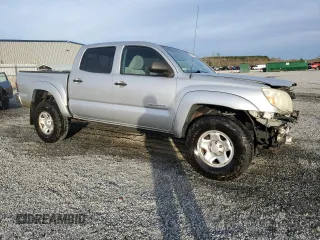 2010 Toyota Tacoma PreRunner with VIN 3TMJU4GN6AM102922, listed as a Copart auction lot 49826455 with 302,827 mi miles and Salvage Title. Bid and sale history available at DreamBid. Image 4.
