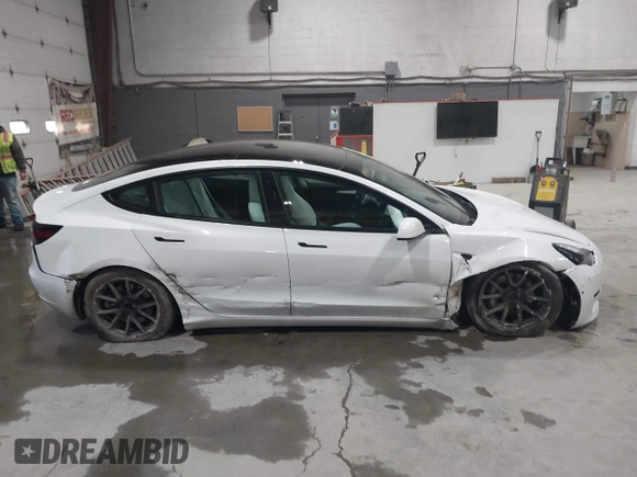 2021 Tesla Model 3 Long Range with VIN 5YJ3E1EBXMF051060, listed as a IAAI auction lot 41958018 with 65,631 mi miles. Bid and sale history available at carsss.com. Image 13.