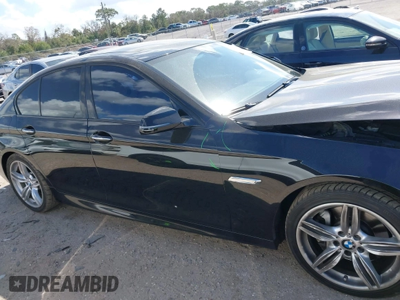 2014 BMW 5 Series 535d with VIN WBAXA5C58ED690447, listed as a IAAI auction lot 41577468 with 149,080 mi miles and . Bid and sale history available at carsss.com. Image 14.