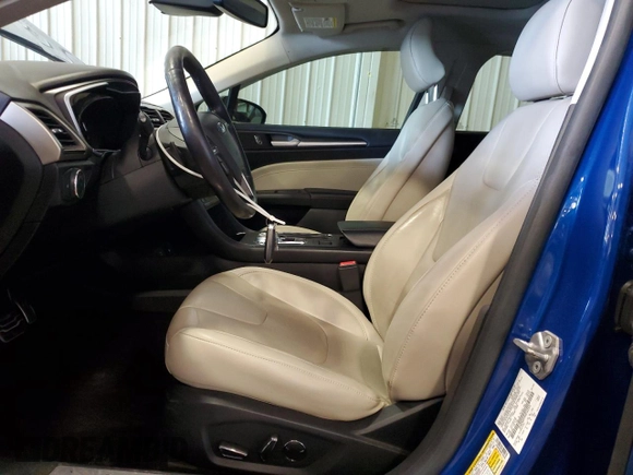 2017 Ford Fusion Titanium z VIN 3FA6P0D99HR162354, wystawiony jako Copart lot #61753395 z przebiegiem 100 678 mil mil oraz Szkoda całkowita • Salvage title. Historia ofert i sprzedaży dostępna na DreamBid. Obrazek 7.