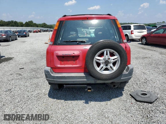2000 Honda CR-V EX with VIN JHLRD1863YC028317, listed as a Copart auction lot 69479084 with 309,824 mi miles and Salvage Title. Bid and sale history available at carsss.com. Image 7.