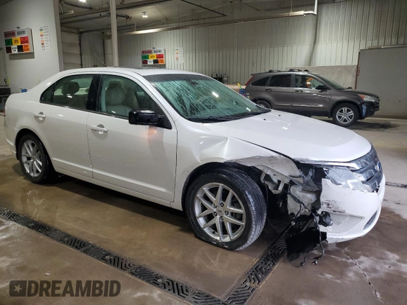 2012 Ford Fusion SEL with VIN 3FAHP0JA9CR167134, listed as a Copart auction lot 50869835 with 128,956 mi miles and Salvage Title. Bid and sale history available at DreamBid. Image 4.
