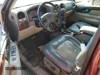 2003 GMC Envoy SLT z VIN 1GKET16S136186780, wystawiony jako Copart lot #55927155 z przebiegiem 163 099 mil mil oraz Szkoda całkowita • Salvage title. Historia ofert i sprzedaży dostępna na DreamBid. Obrazek 8.
