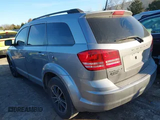 2018 Dodge Journey SE with VIN 3C4PDCAB5JT535737, listed as a IAAI auction lot 41482966 with 97,001 mi miles. Bid and sale history available at carsss.com. Image 3.