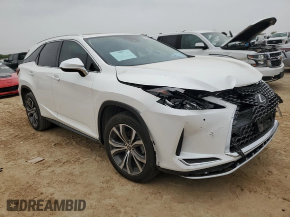 2021 Lexus RX with VIN JTJHZKEA2M2020568, listed as a Copart auction lot 51329565 with 51,961 mi miles and Salvage Title. Bid and sale history available at carsss.com. Image 4.