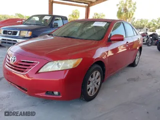 2007 Toyota Camry CE with VIN JTNBE46K873115041, listed as a IAAI auction lot 42023383 with 184,372 mi miles. Bid and sale history available at carsss.com. Image 2.