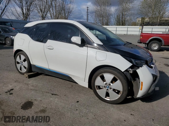 2014 BMW i3 with VIN WBY1Z4C57EV277634, listed as a Copart auction lot 51701885 with 0 mi miles and Salvage Title. Bid and sale history available at carsss.com. Image 4.
