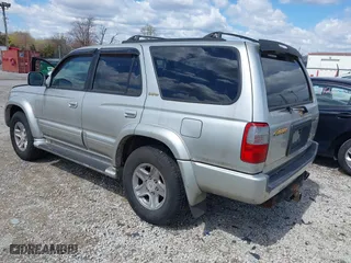 2000 Toyota 4Runner Limited with VIN JT3HN87R0Y9037357, listed as a IAAI auction lot 39201163 with 166,431 mi miles. Bid and sale history available at carsss.com. Image 3.