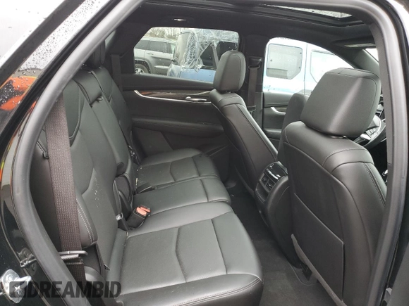 2021 Cadillac XT5 AWD Sport z VIN 1GYKNGRS3MZ158562, wystawiony jako Copart lot #43593295 z przebiegiem 32 293 mil mil oraz Szkoda całkowita • Salvage title. Historia ofert i sprzedaży dostępna na DreamBid. Obrazek 10.