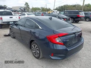 2018 Honda Civic EX with VIN 19XFC2F75JE035935, listed as a IAAI auction lot 41795110 with 92,687 mi miles and . Bid and sale history available at DreamBid. Image 3.