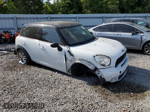 2014 MINI Countryman S with VIN WMWZC3C59EWT00838, listed as a Copart auction lot 53608055 with 114,520 mi miles and Non Repairable. Bid and sale history available at DreamBid. Image 4.