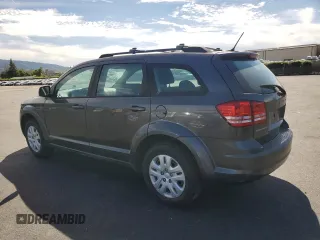 2014 Dodge Journey SE with VIN 3C4PDCABXET308940, listed as a Copart auction lot 52049255 with 119,955 mi miles and Salvage Title. Bid and sale history available at carsss.com. Image 2.