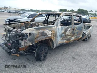 2023 Toyota Tacoma SR5 z VIN 3TMAZ5CN8PM213333, wystawiony jako IAAI lot #41475450 z przebiegiem Nie podano mil oraz . Historia ofert i sprzedaży dostępna na DreamBid. Obrazek 2.