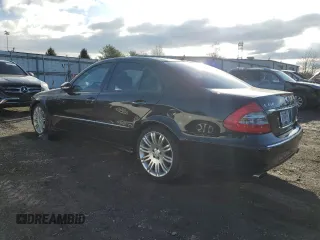 2007 Mercedes-Benz E-Class 3.5L with VIN WDBUF56X77B166210, listed as a Copart auction lot 51114065 with 165,297 mi miles and Salvage Title. Bid and sale history available at carsss.com. Image 2.