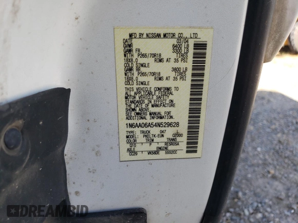 2004 Nissan Titan SE z VIN 1N6AA06A54N529628, wystawiony jako Copart lot #61020005 z przebiegiem 258 224 mil mil oraz Czysty tytuł • Clean title. Historia ofert i sprzedaży dostępna na DreamBid. Obrazek 12.