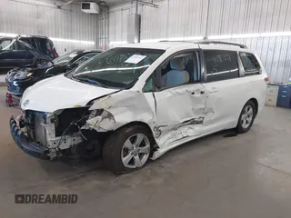 2011 Toyota Sienna LE AAS with VIN 5TDKK3DC6BS144970, listed as a IAAI auction lot 41881551 with 168,148 mi miles. Bid and sale history available at carsss.com. Image 2.