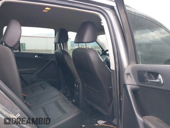 2016 Volkswagen Tiguan S with VIN WVGBV7AX6GW607716, listed as a IAAI auction lot 42085386 with 154,348 mi miles and . Bid and sale history available at DreamBid. Image 8.